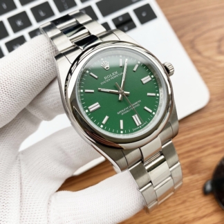 Rolex Oyster Perpetual Green face Lady