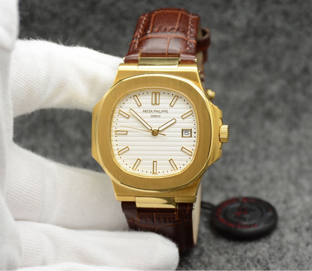 Patek Philippe Nautilus Gold Bezel White Face